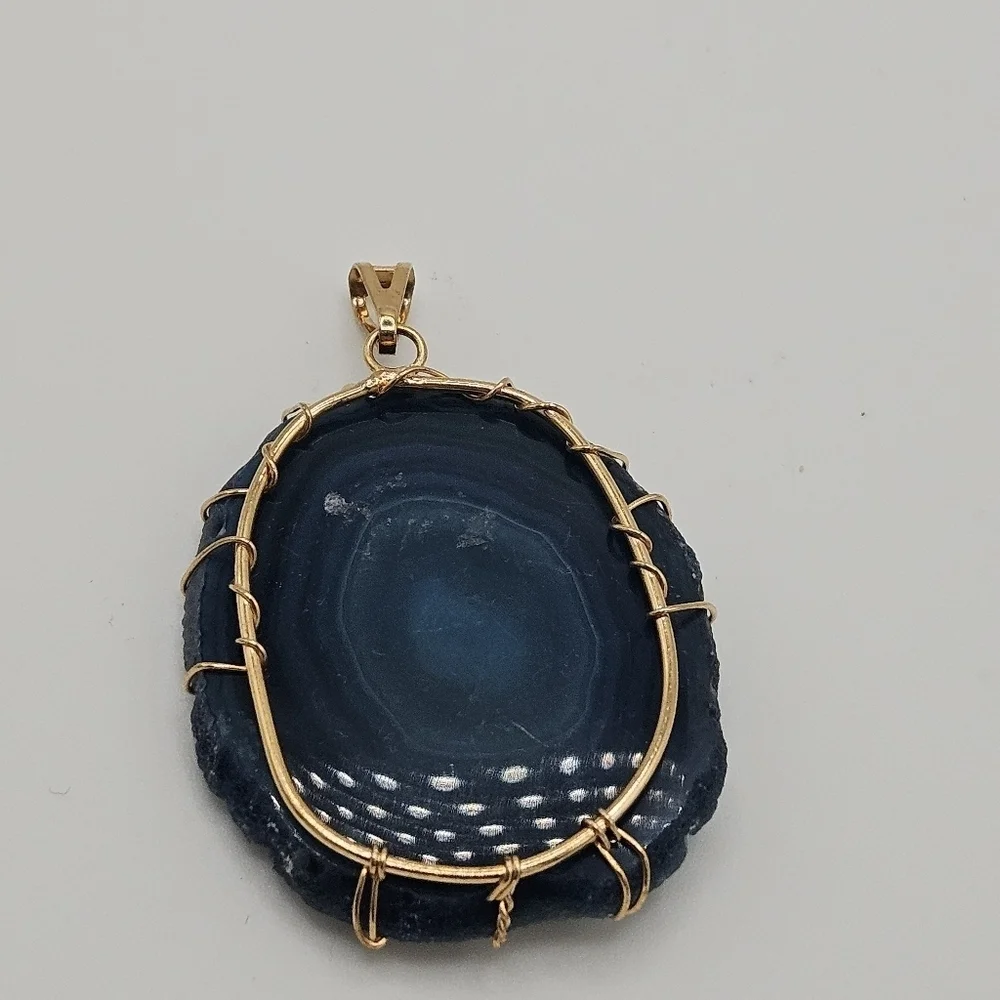 blue agate slice pendant with gold tone wire tree of life